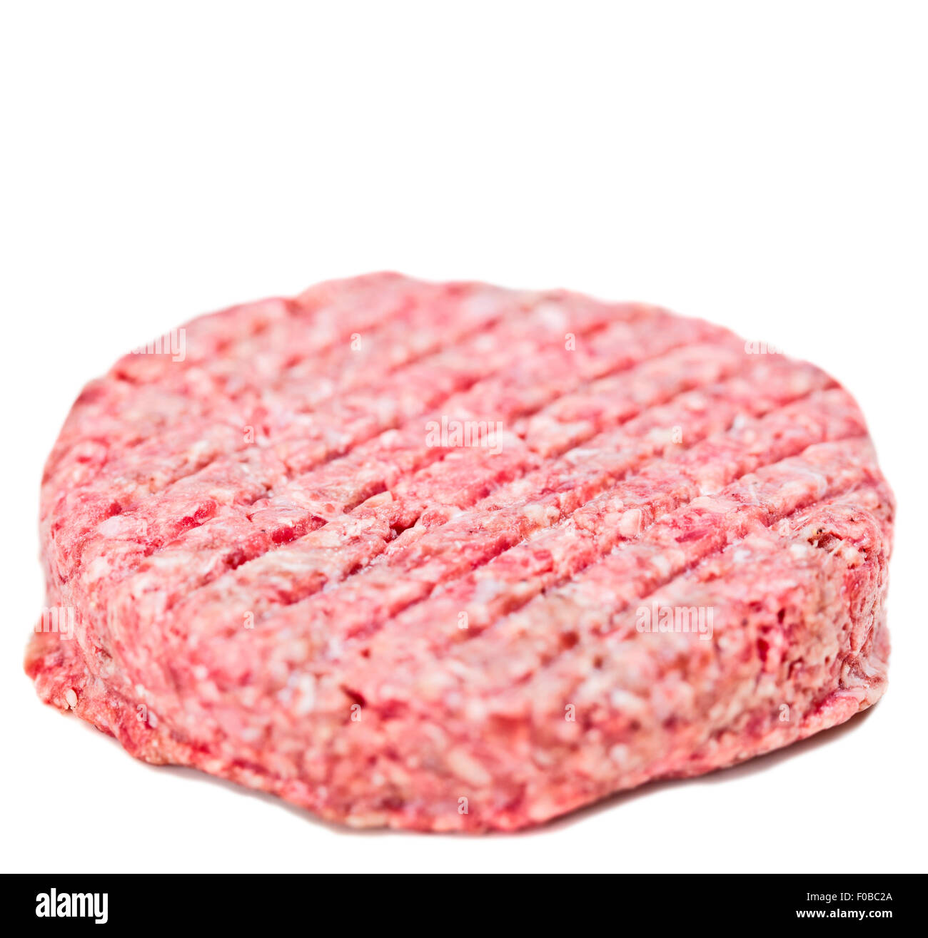 Crudo fresco burger patty Foto Stock