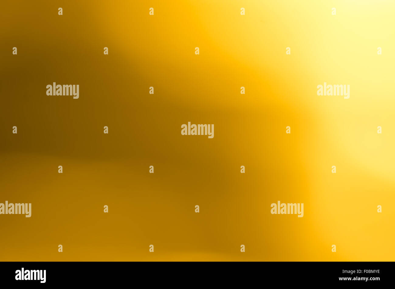 Abstract luce sfocati colore dorato texture di sfondo Foto Stock