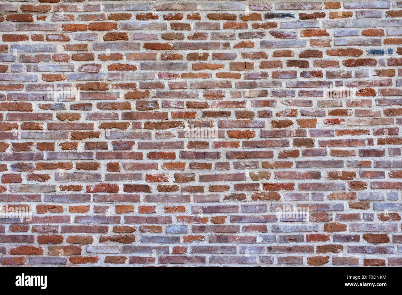 Muro di mattoni in background. Personalizzabile parete di mattoni texture di sfondo, vista frontale. Foto Stock