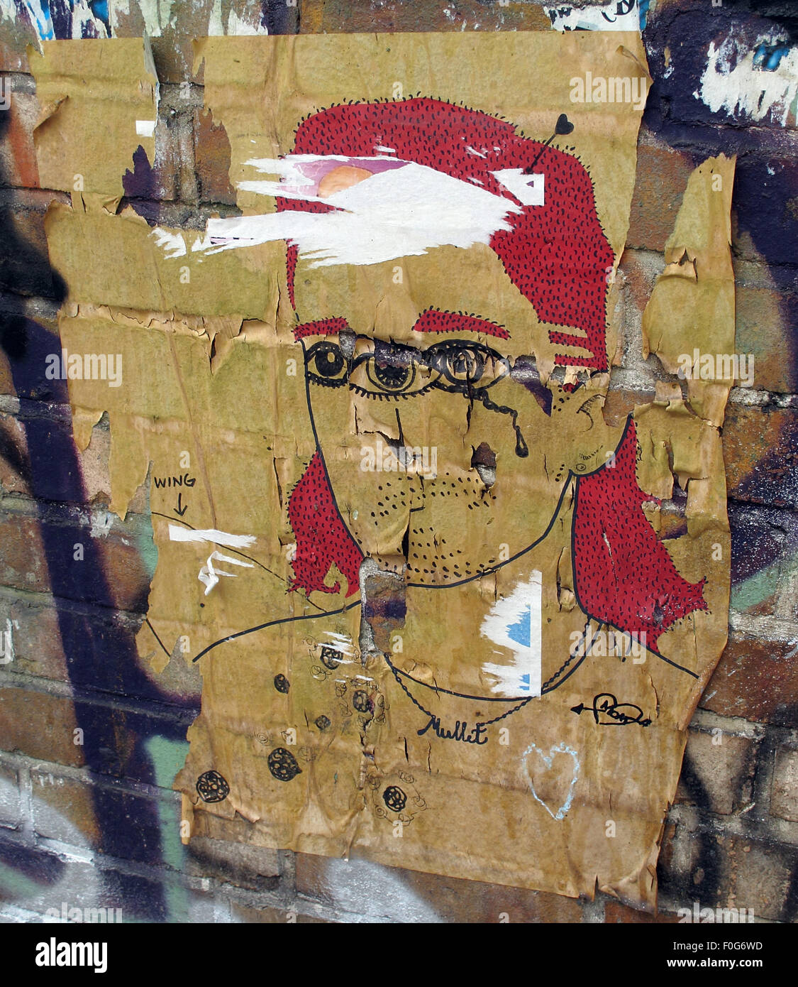 Berlin Mitte,street art su pareti,Germania- uomo con tre occhi Foto Stock