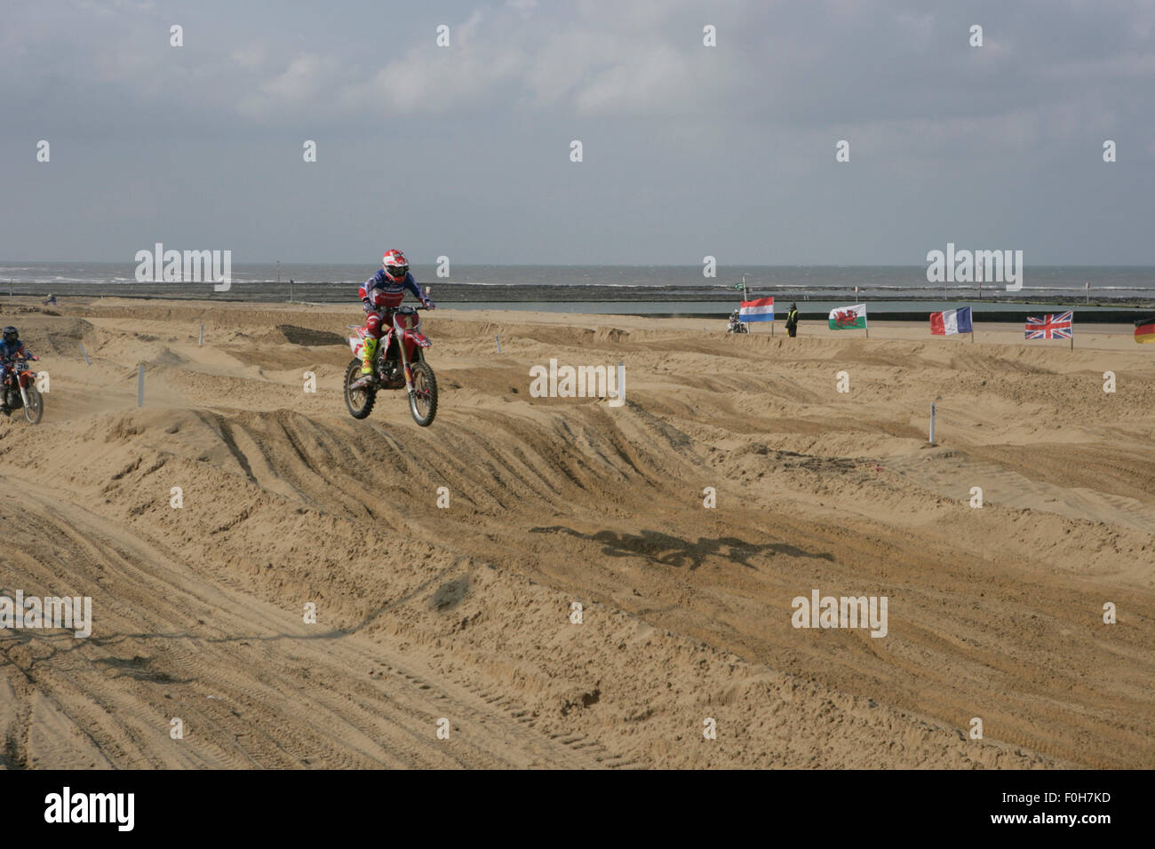 Usi alternativi della spiaggia: beachcross, una gara di moto Foto Stock
