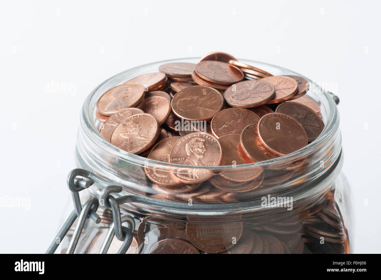 Mason vaso pieno di Stati Uniti pochi spiccioli Foto Stock