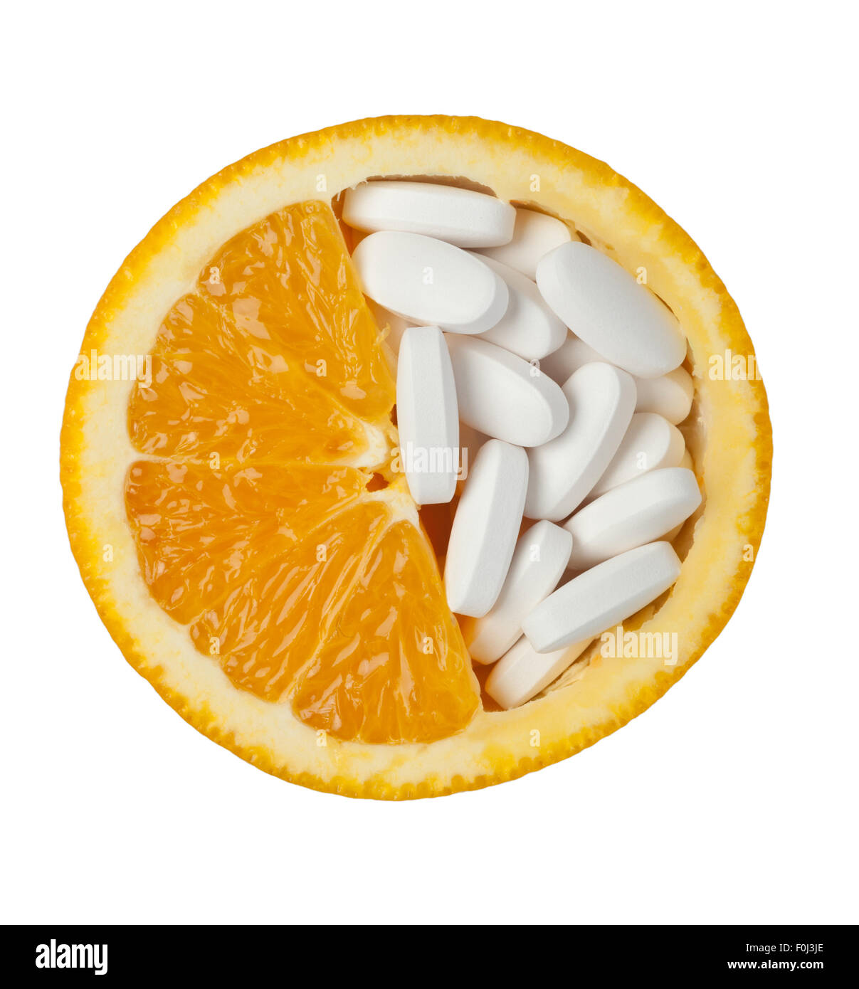 White pillole medicinali in un isolato di colore arancione su sfondo bianco Foto Stock