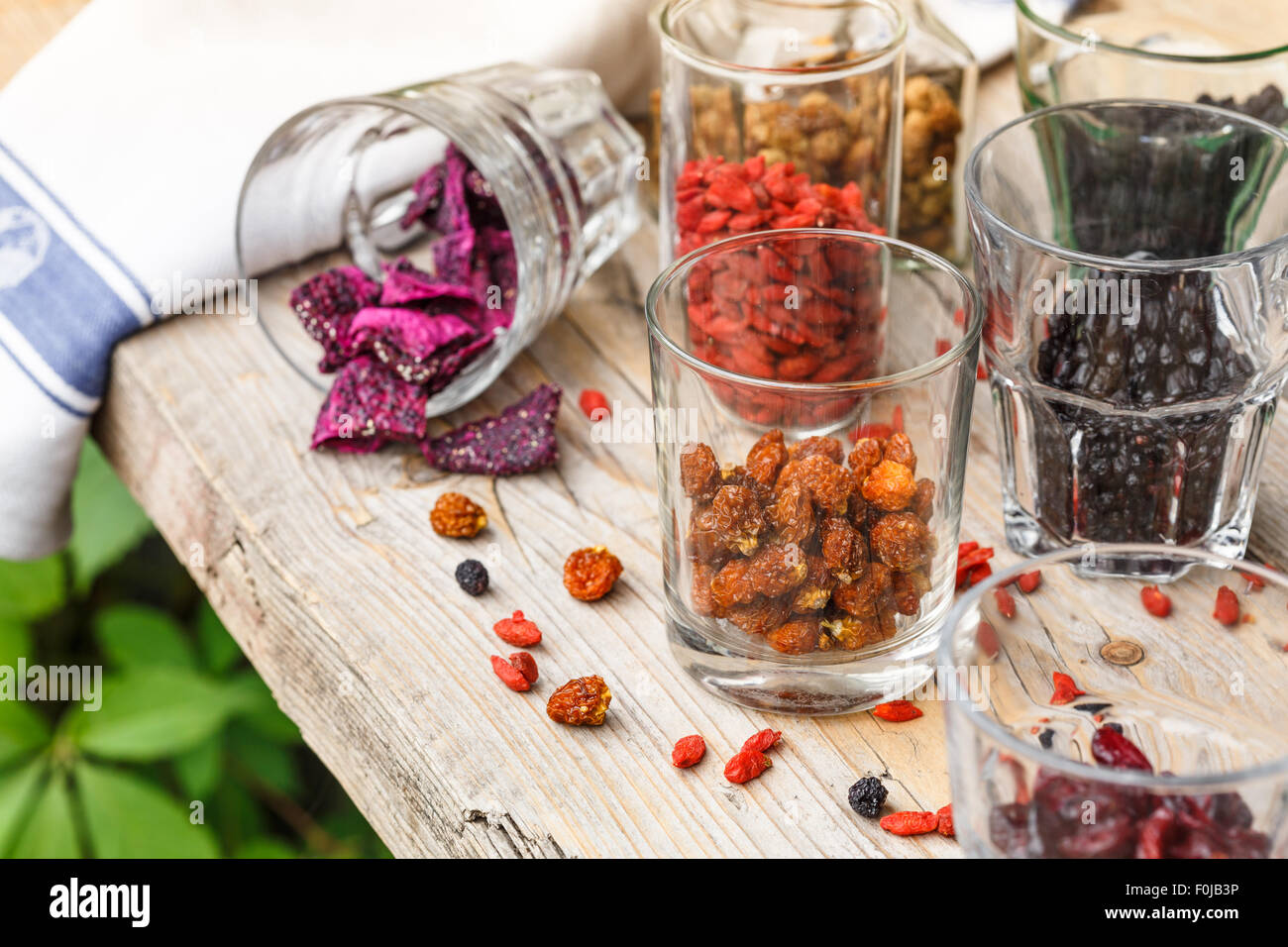 Occhiali con superfruits essiccato Foto Stock