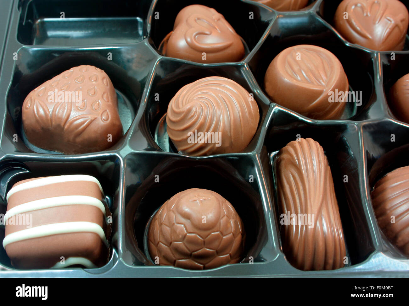 Ripresa macro di una scatola di cioccolatini Foto Stock