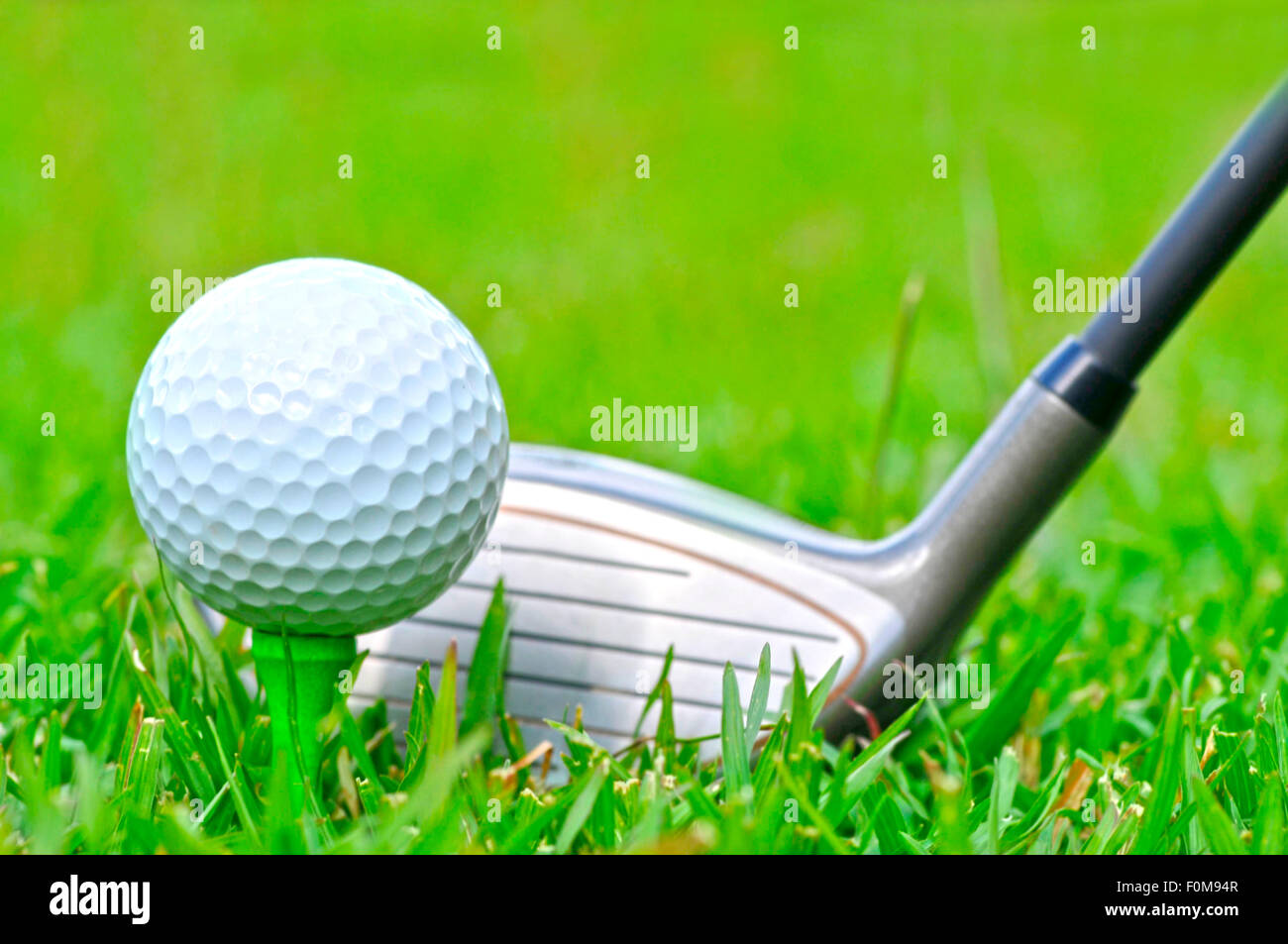 Con una mazza da golf immagini e fotografie stock ad alta risoluzione -  Alamy