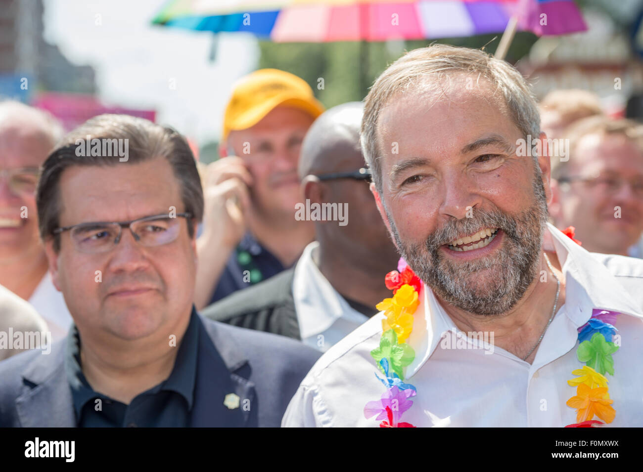 MONTREAL, Canada, 16 agosto 2015. Il sindaco di Montreal Denis Coderre e candidato NDP Thomas la Mulcair frequentare il 2015 Gay Pride Parade di Montreal. © Marc Bruxelle/Alamy Live News Foto Stock
