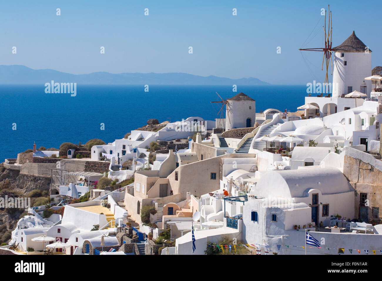 Il mulino a vento di Oia, l'ultimo e il miglior villaggio per il tramonto sull'isola di Santorini, Grecia 2014. Foto Stock