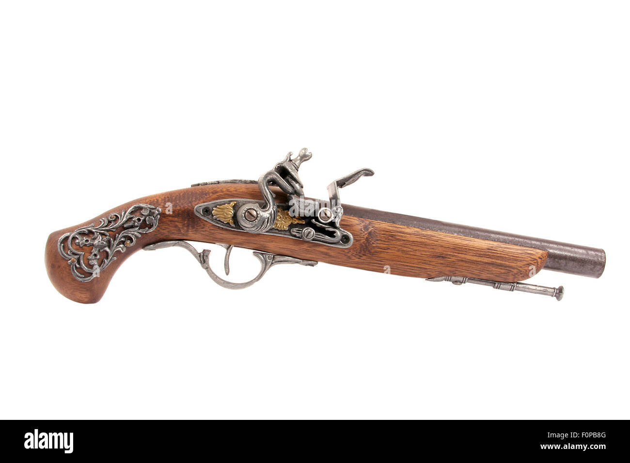 Replica di un vecchio revolver isolato su bianco Foto Stock