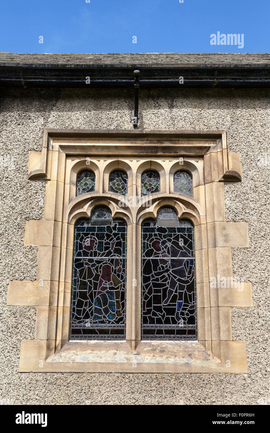 Finestra in Saint Oswald è la chiesa, Grasmere, Lake District, Cumbria, Inghilterra Foto Stock