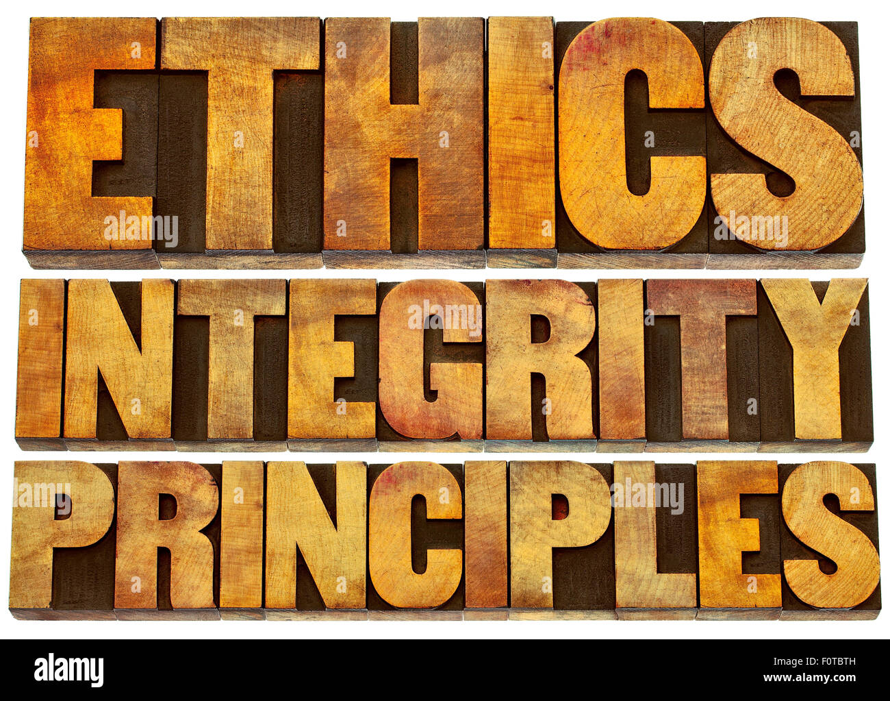 Etica e integrità e di principi astratti di word - testo isolato in rilievografia grunge tipo legno blocchi di stampa Foto Stock