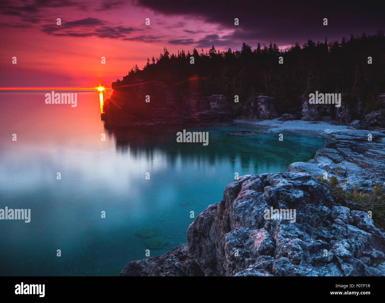 Sunrise a Indian Head Cove nella penisola di Bruce Parco Nazionale Foto Stock