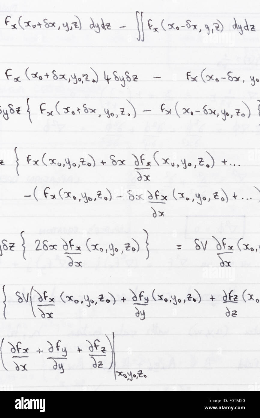 Studio di appunti scritti su carta rivestita con formule scientifiche per la divergenza di campi vettoriali Foto Stock