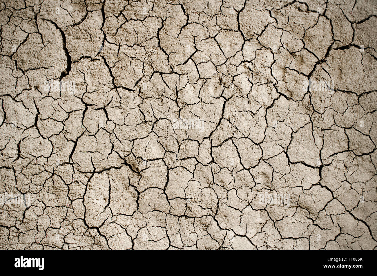 Asciutto terra incrinato sfondo, argilla texture del deserto Foto Stock