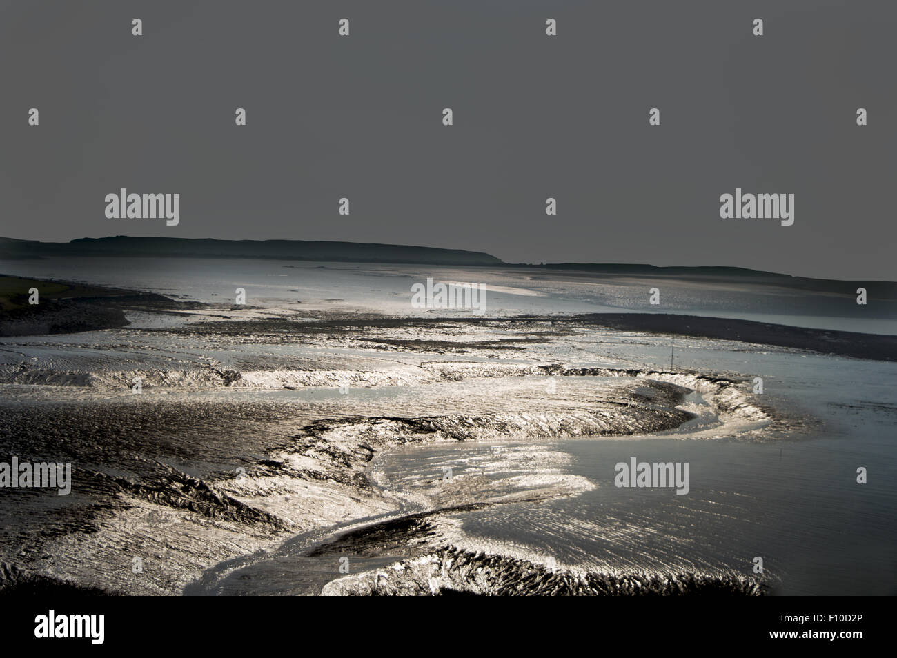 Configurazioni formate dal movimento delle maree sfuggente di Clevedon beach Foto Stock
