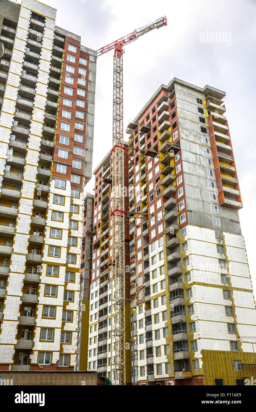 Molti alti edifici in costruzione e gru Foto Stock