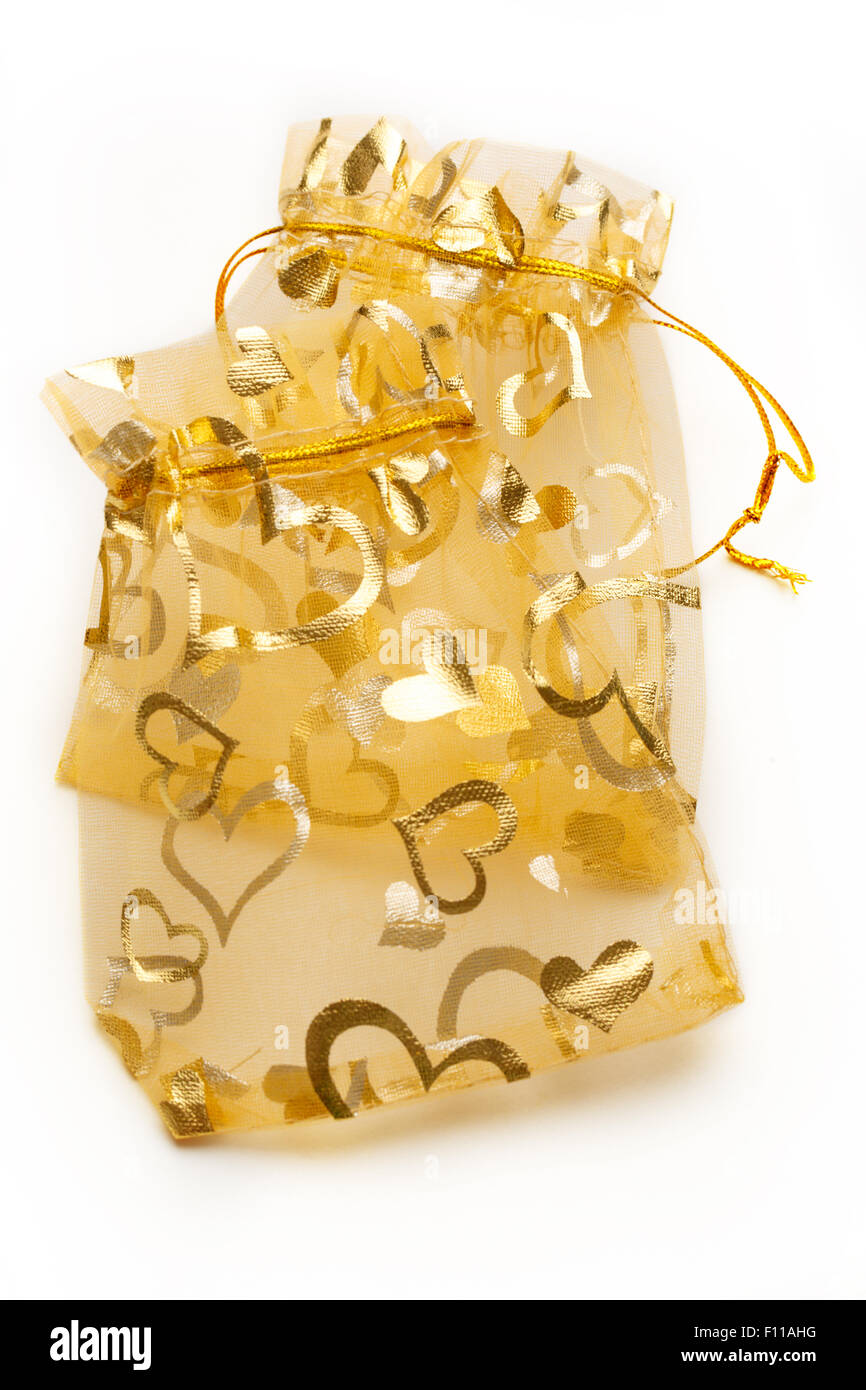 Romantico golden buste regalo su sfondo bianco Foto Stock