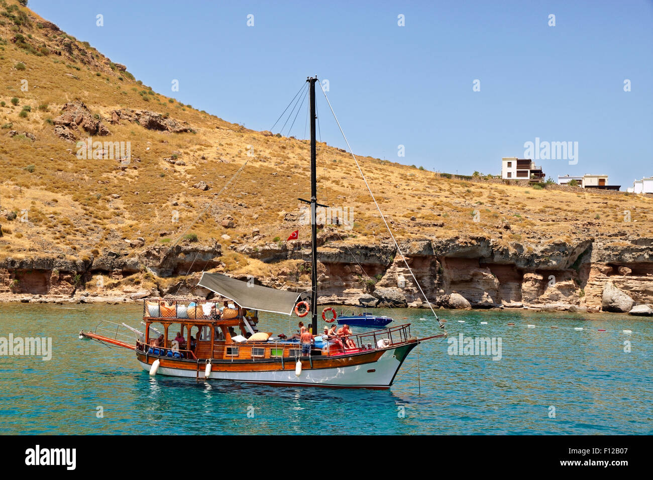 Gulet piccole gite di un giorno in barca di crociera al di ancoraggio vicino a Bodrum in Turchia Foto Stock