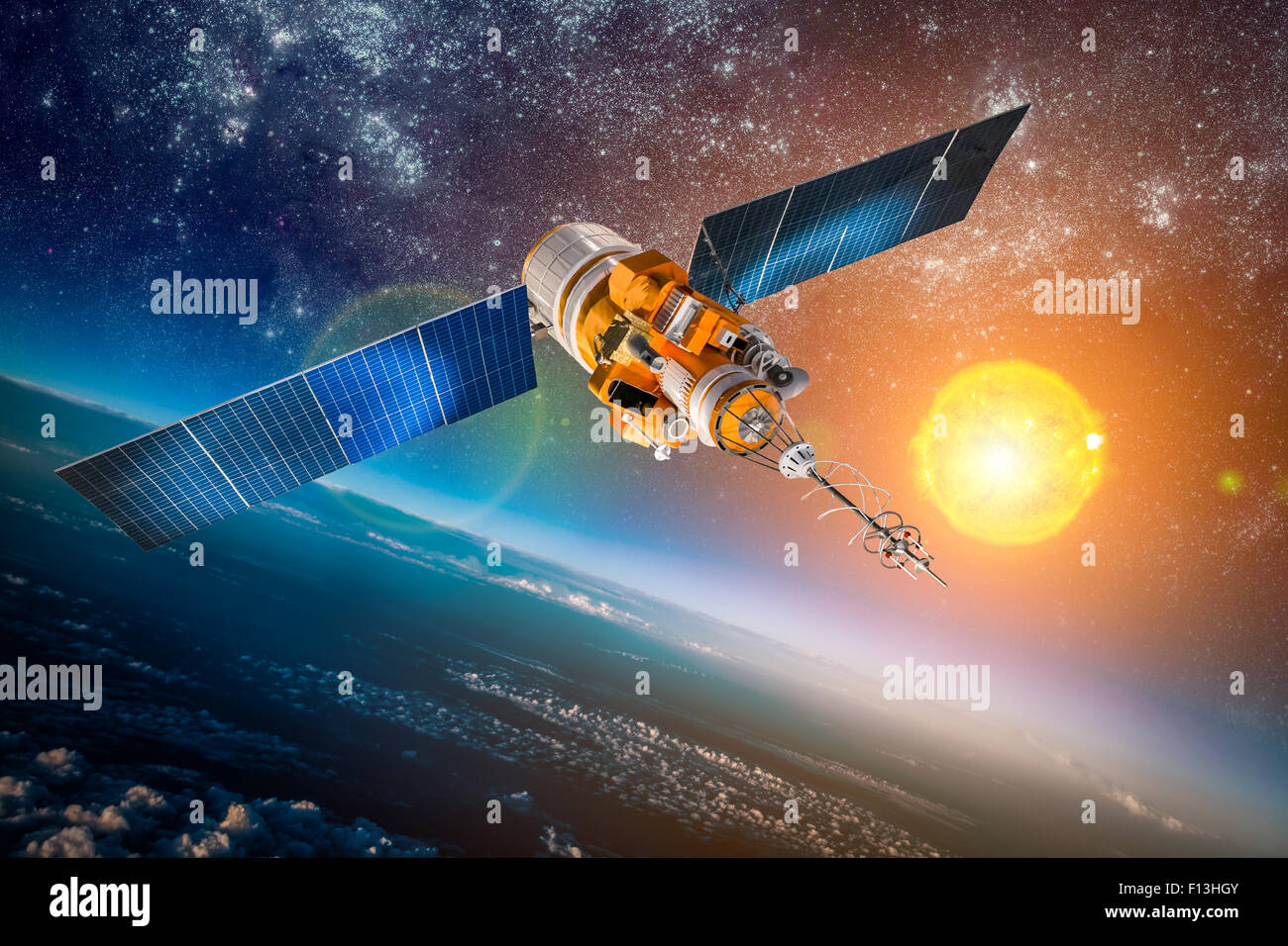 Spazio satellite in orbita attorno alla terra su una stella sullo sfondo sun. Gli elementi di questa immagine fornita dalla NASA. Foto Stock