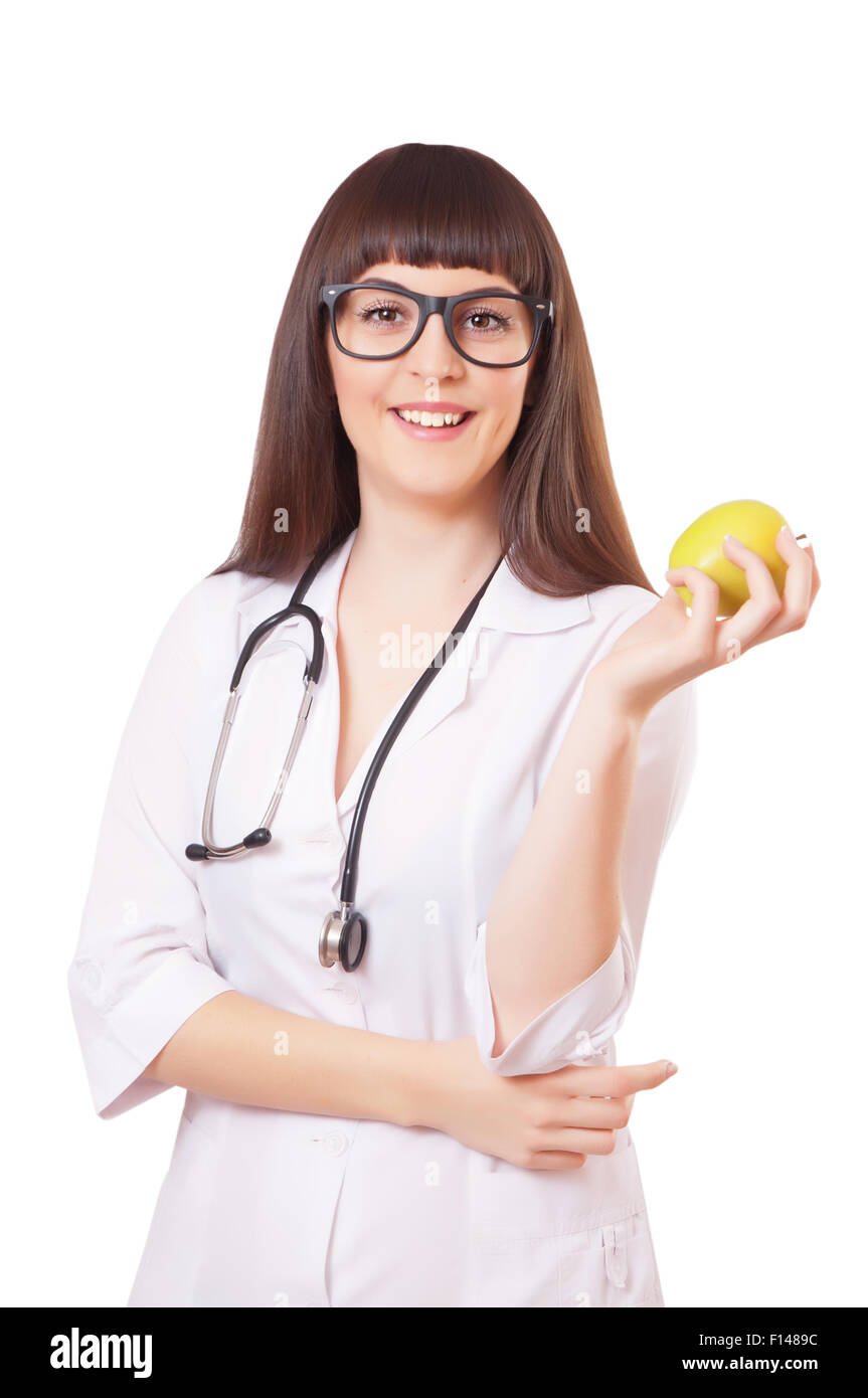 La donna in un bianco camice con Apple Foto Stock