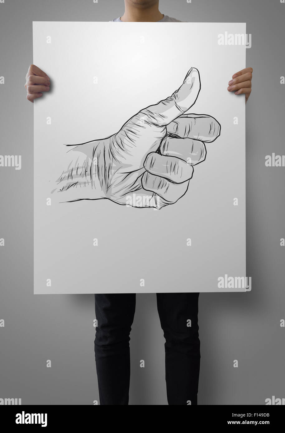 Uomo che mostra il poster disegnati a mano di mano dando un pollice in alto come concetto Foto Stock