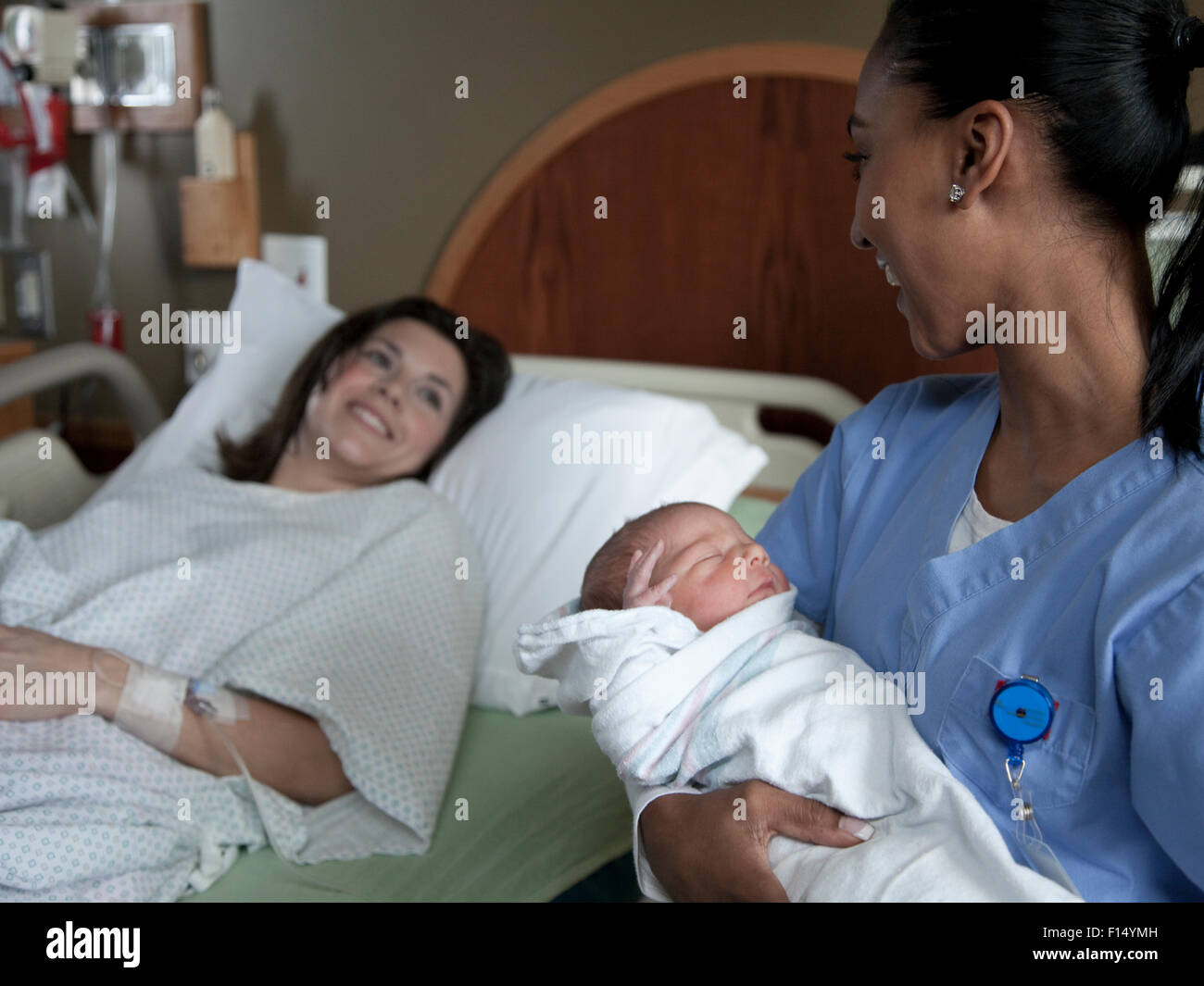 Stati Uniti d'America, Utah, Payson, Infermiere azienda bambino neonato Foto Stock