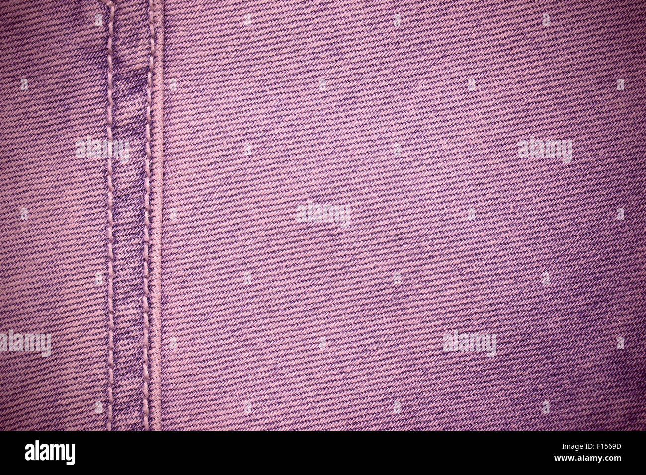 Rosa sfondo jeans o cotone texture con cucitura Foto Stock