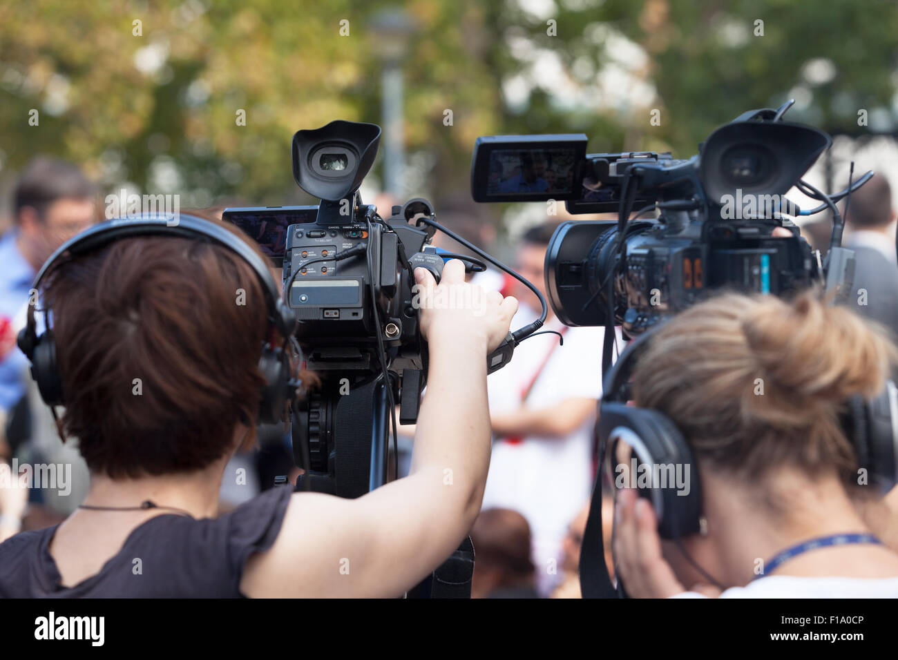 News conferenza. La ripresa di un evento con una videocamera. Foto Stock