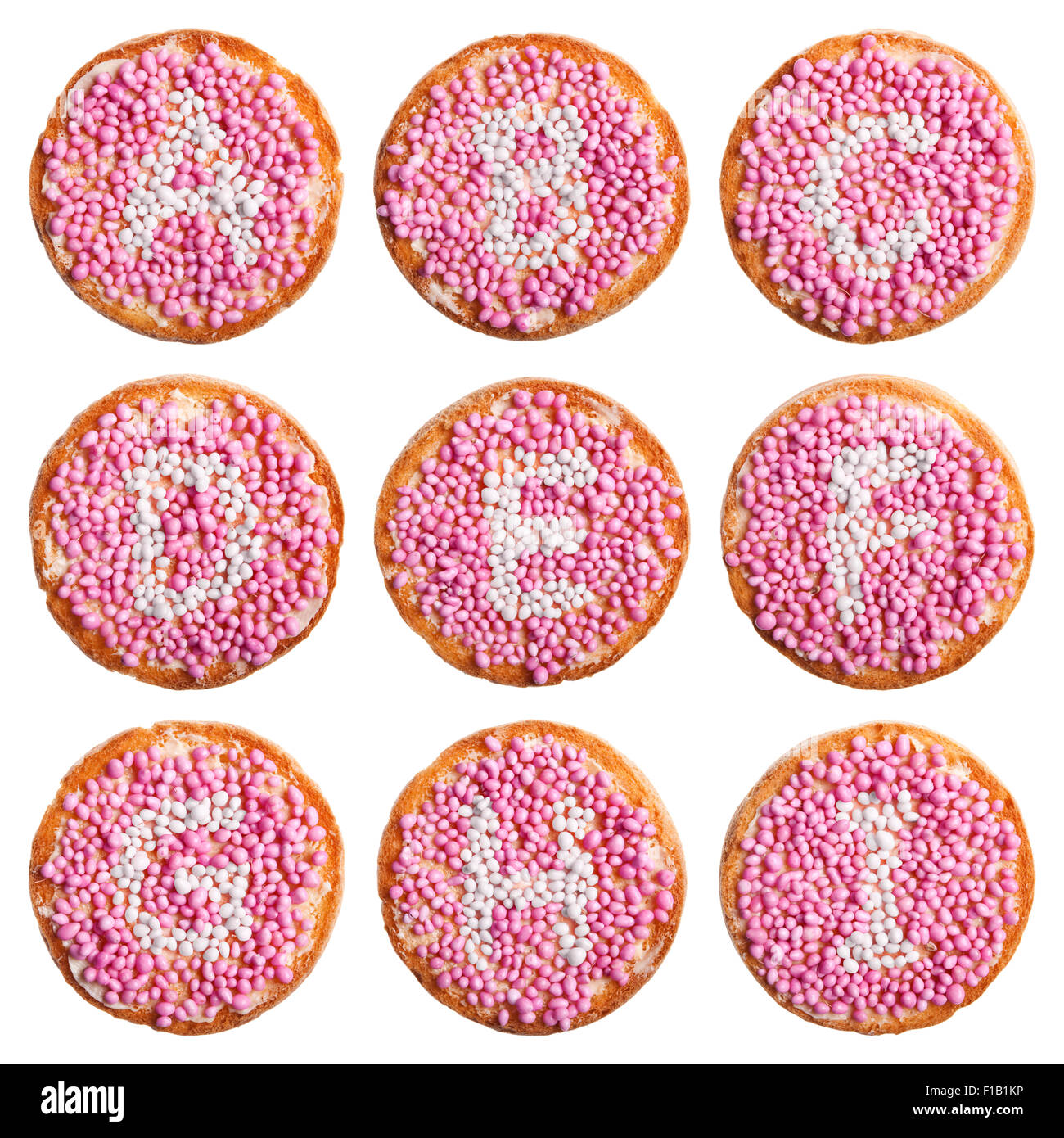 "Beschuit met muisjes', un tradizionale trattamento per festeggiare la nascita di un bambino nei Paesi Bassi. Rosa per una ragazza. Foto Stock