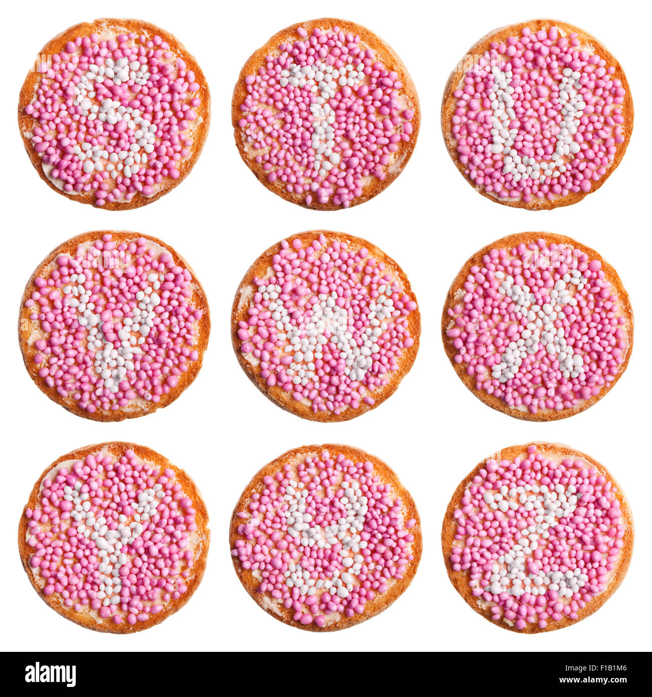 "Beschuit met muisjes', un tradizionale trattamento per festeggiare la nascita di un bambino nei Paesi Bassi. Rosa per una ragazza. Foto Stock