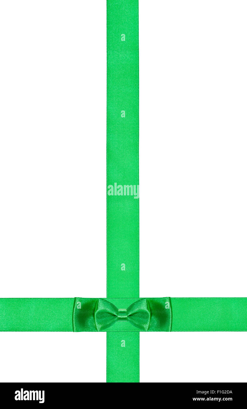 Poco verde doppia nodo di prua sulla traversata di due nastri di seta isolati su sfondo bianco Foto Stock