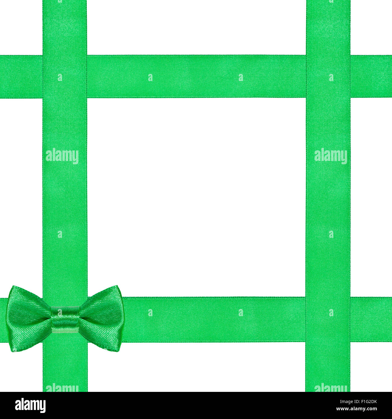 Verde nodo di prua su quattro nastri di raso isolati su sfondo bianco Foto Stock