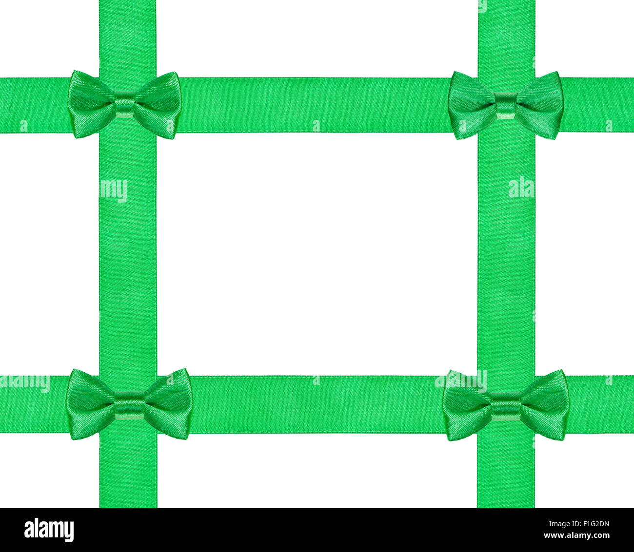 Quattro piccoli green bow knots sui quattro nastri di raso isolati su sfondo bianco Foto Stock