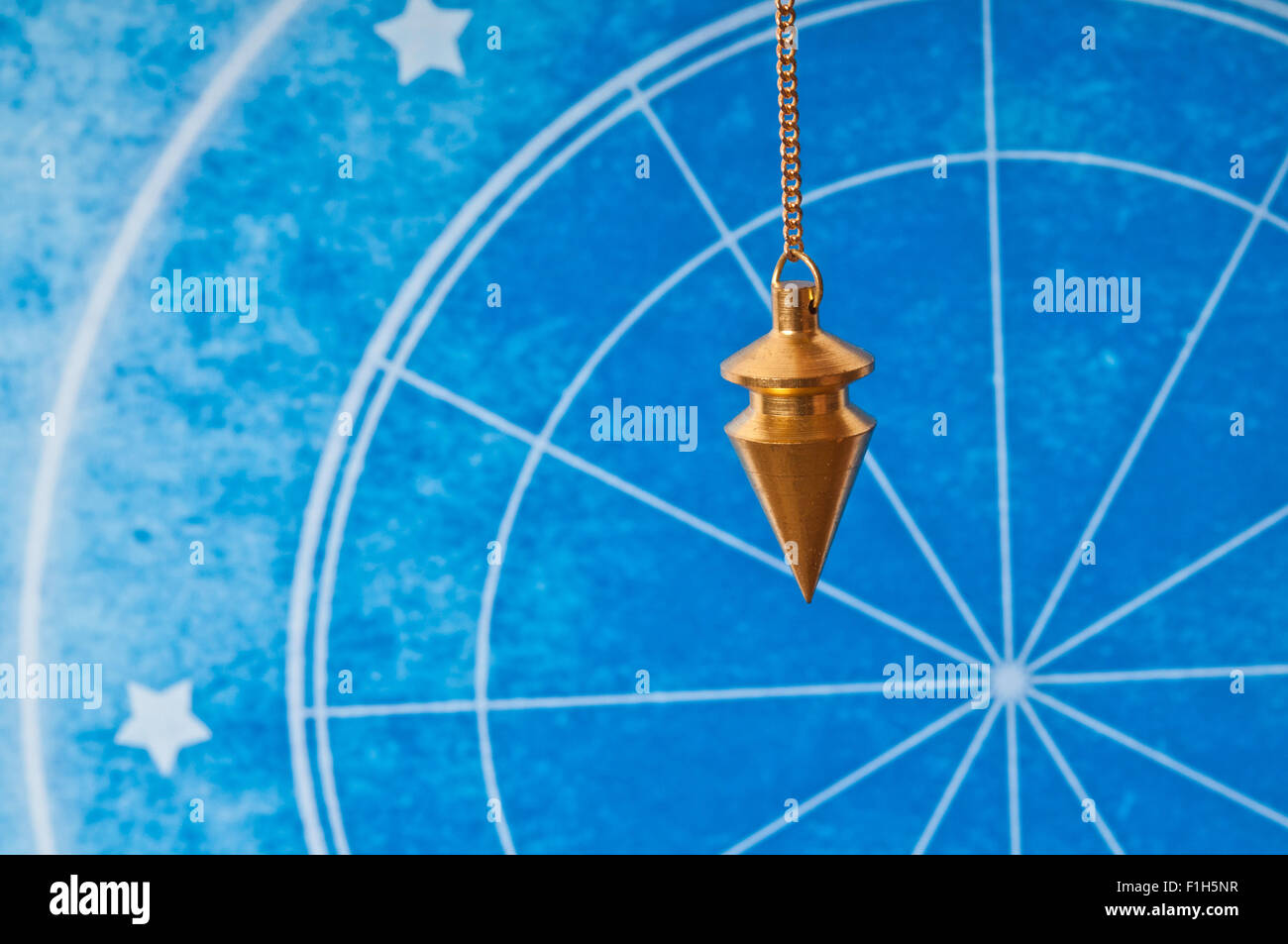Astrologia e pendolo Foto Stock