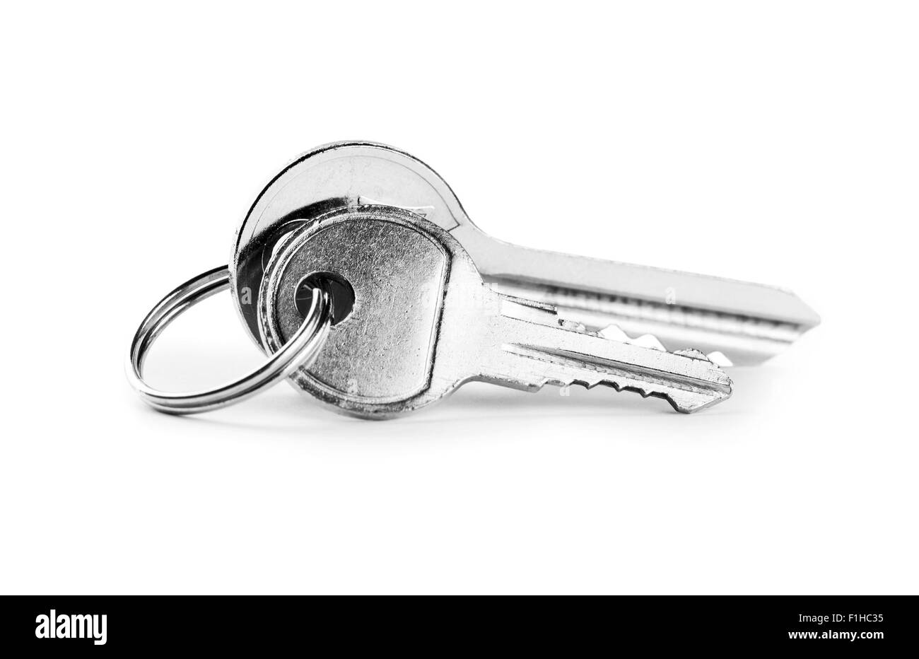 Le chiavi di casa su sfondo bianco Foto Stock
