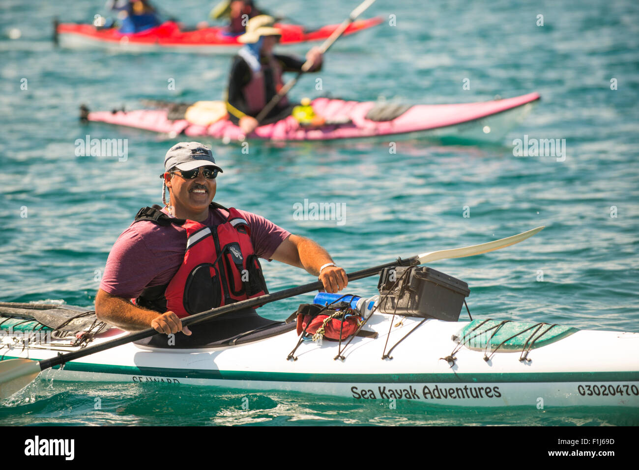Messico, Baja, Lapaz, Espiritu Santo. Guida turistica di sorridere alla telecamera. Foto Stock