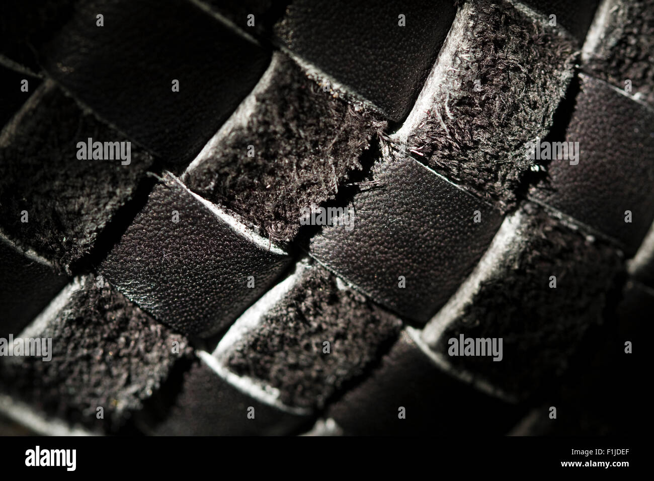 Close up di un cestello del modello di armatura in nero a strisce di cuoio Foto Stock