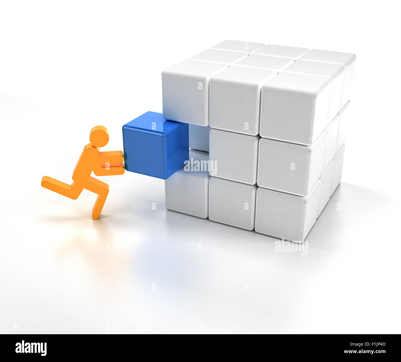 Montaggio pezzo mancante di un puzzle cube Foto Stock