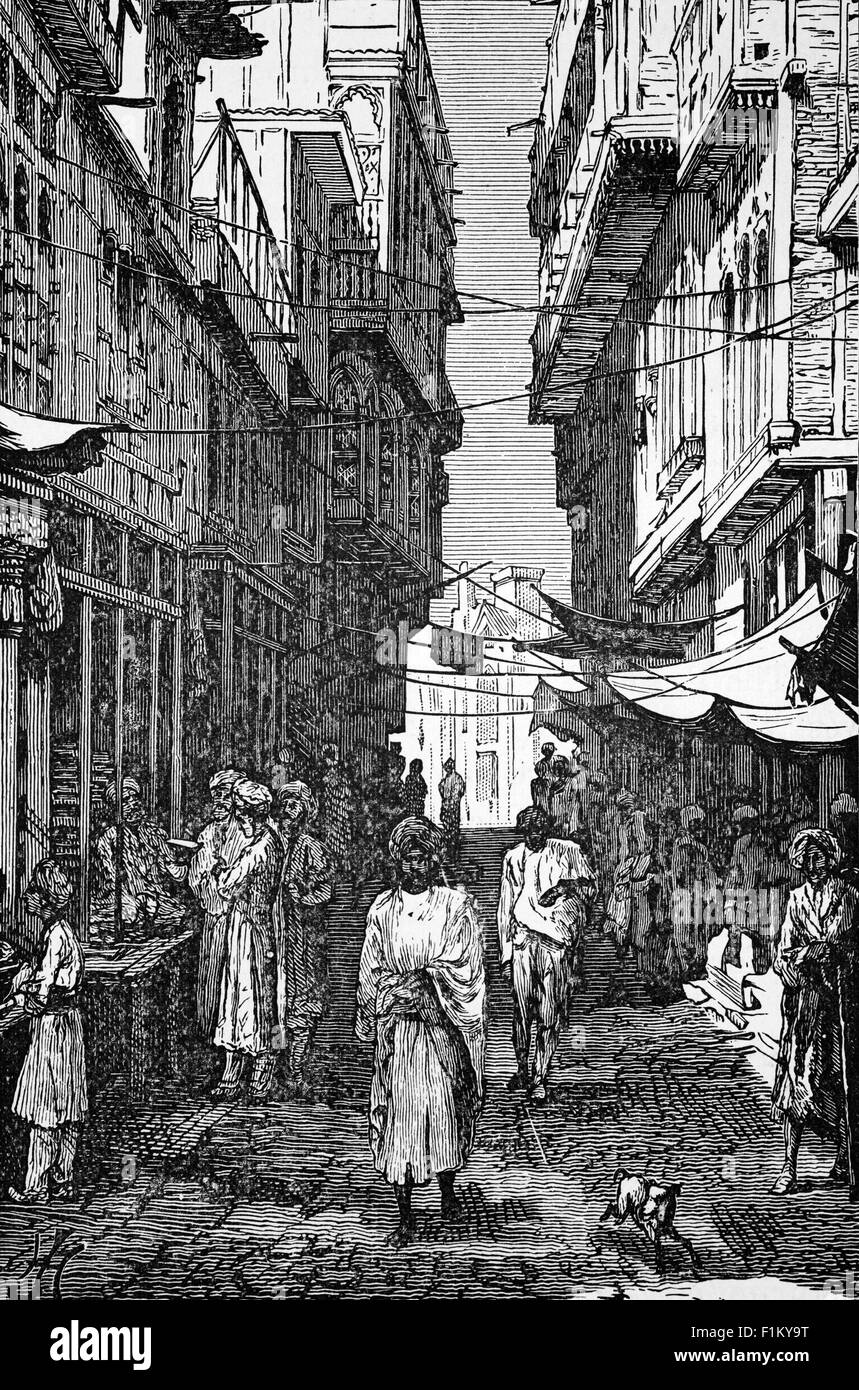 Una scena di strada del 19 ° secolo a Peshawar, capitale della provincia pakistana di Khyber Pakhtunkhwa e la sua città più grande. Situata nell'ampia Valle di Peshawar, vicino all'estremità orientale del Passo Khyber, vicino al confine con l'Afghanistan, la città era un importante centro commerciale durante l'epoca Mughal. Divenne parte dell'Impero afghano Durrani nel dicembre 1747, e servì come capitale invernale afghana dal 1776 fino alla cattura della città da parte dell'Impero Sikh nel marzo 1823, che fu poi seguito dagli inglesi nel 1846. Foto Stock