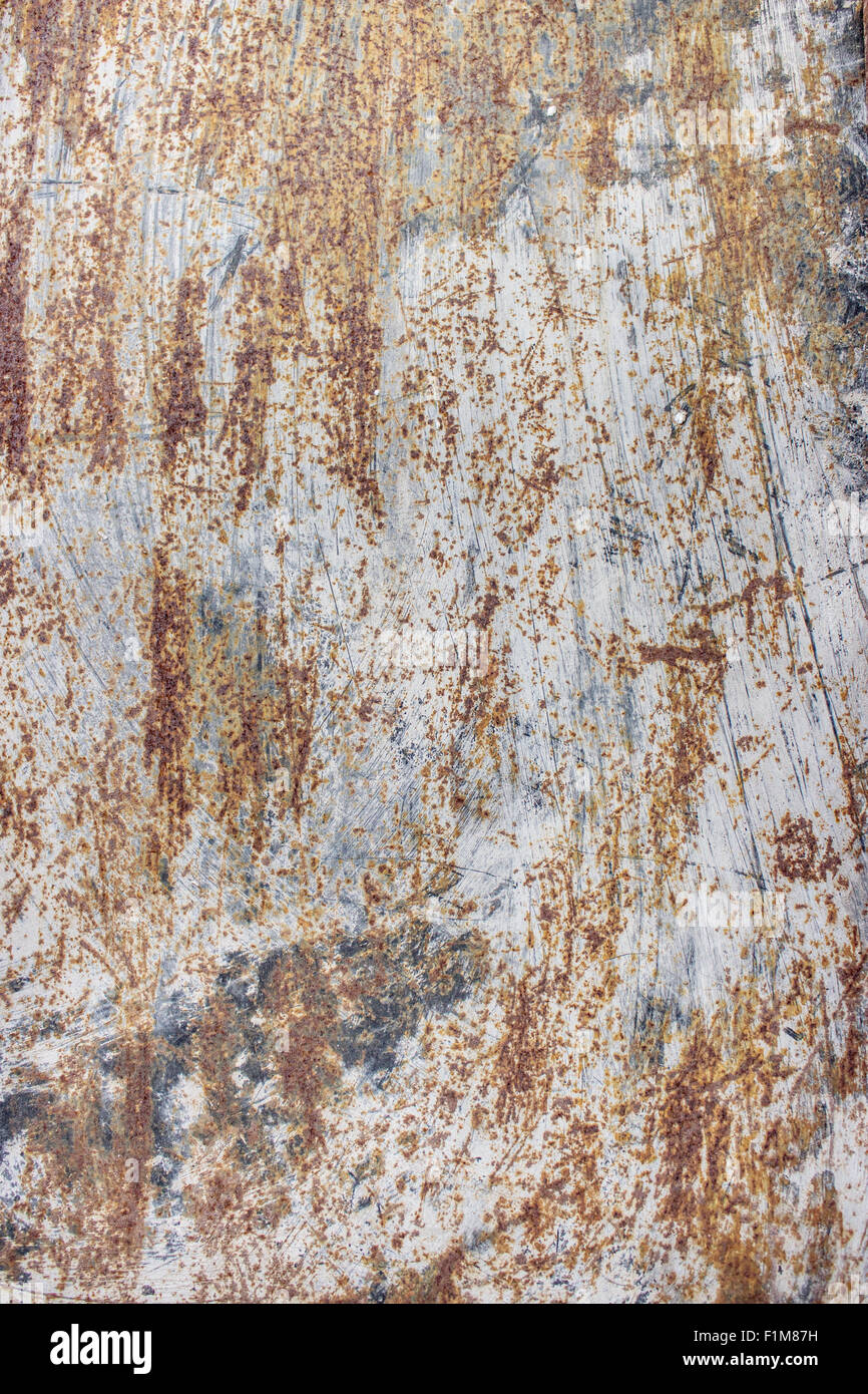 Una texture graffiato arrugginito piastra in metallo Foto Stock
