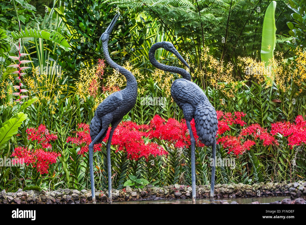 Singapore Botanic Gardens, sculture di gru presso il National Orchid Gardens Foto Stock