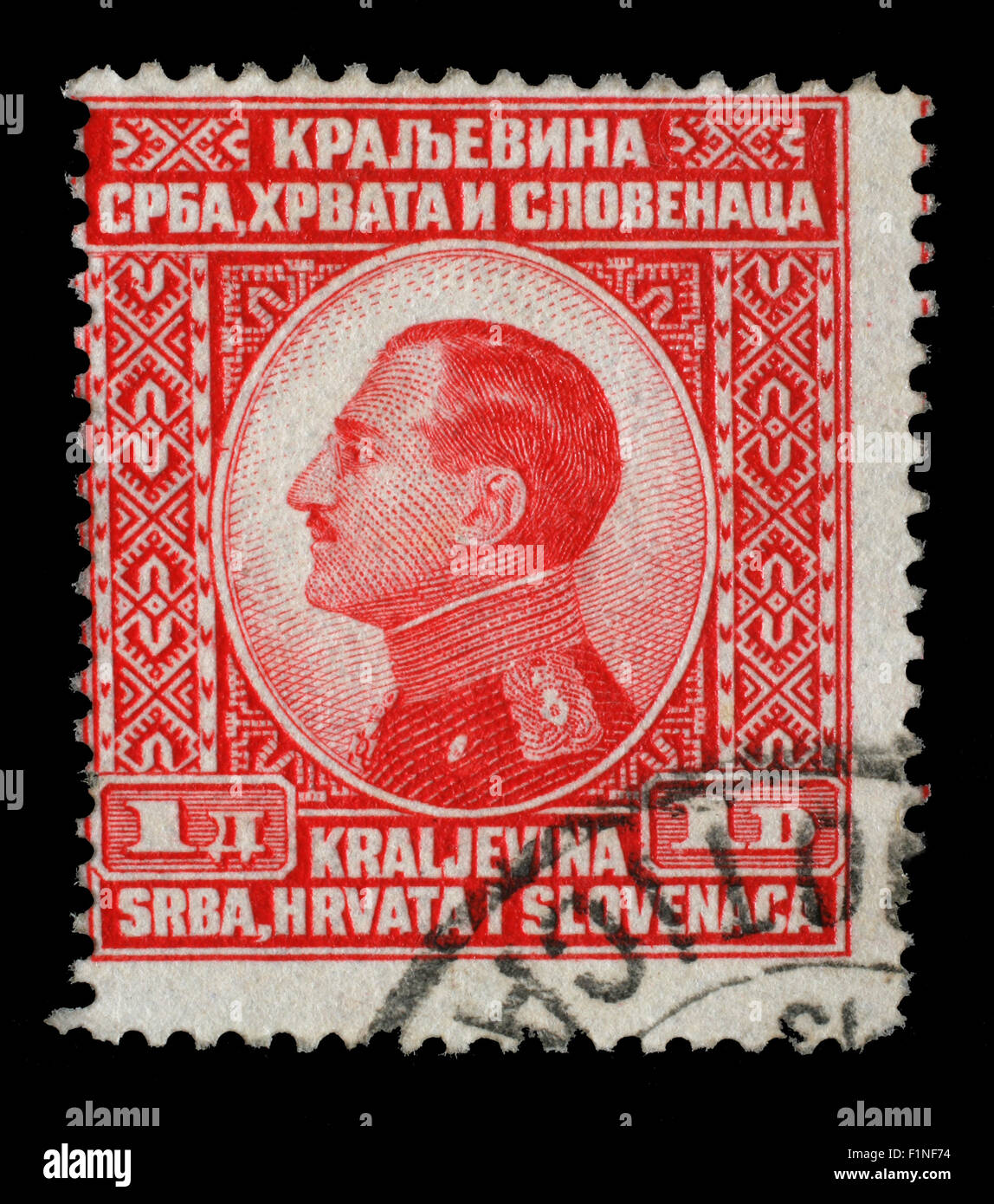 Timbro stampato in Iugoslavia (Regno della Serbia, della Croazia e della Slovenia) mostra ritratto del re Alessandro I,circa 1924 Foto Stock