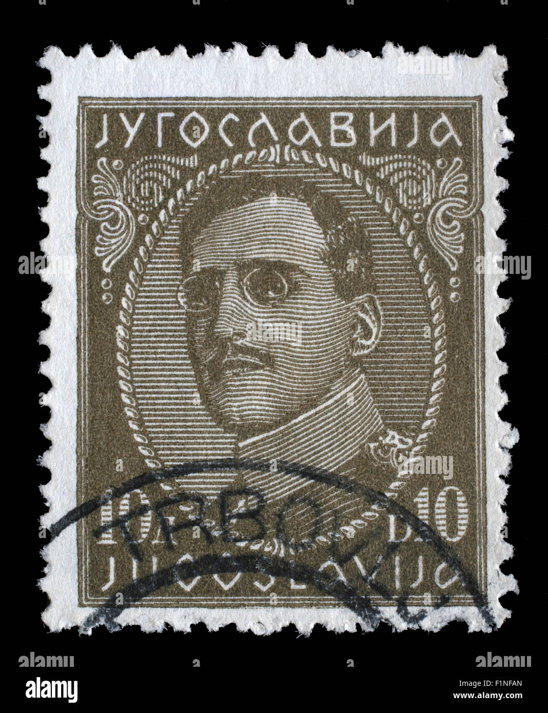 Timbro stampato in Jugoslavia mostra ritratto del re Alessandro I (1888-1934), a partire dalla serie re Alessandro I, Foto Stock