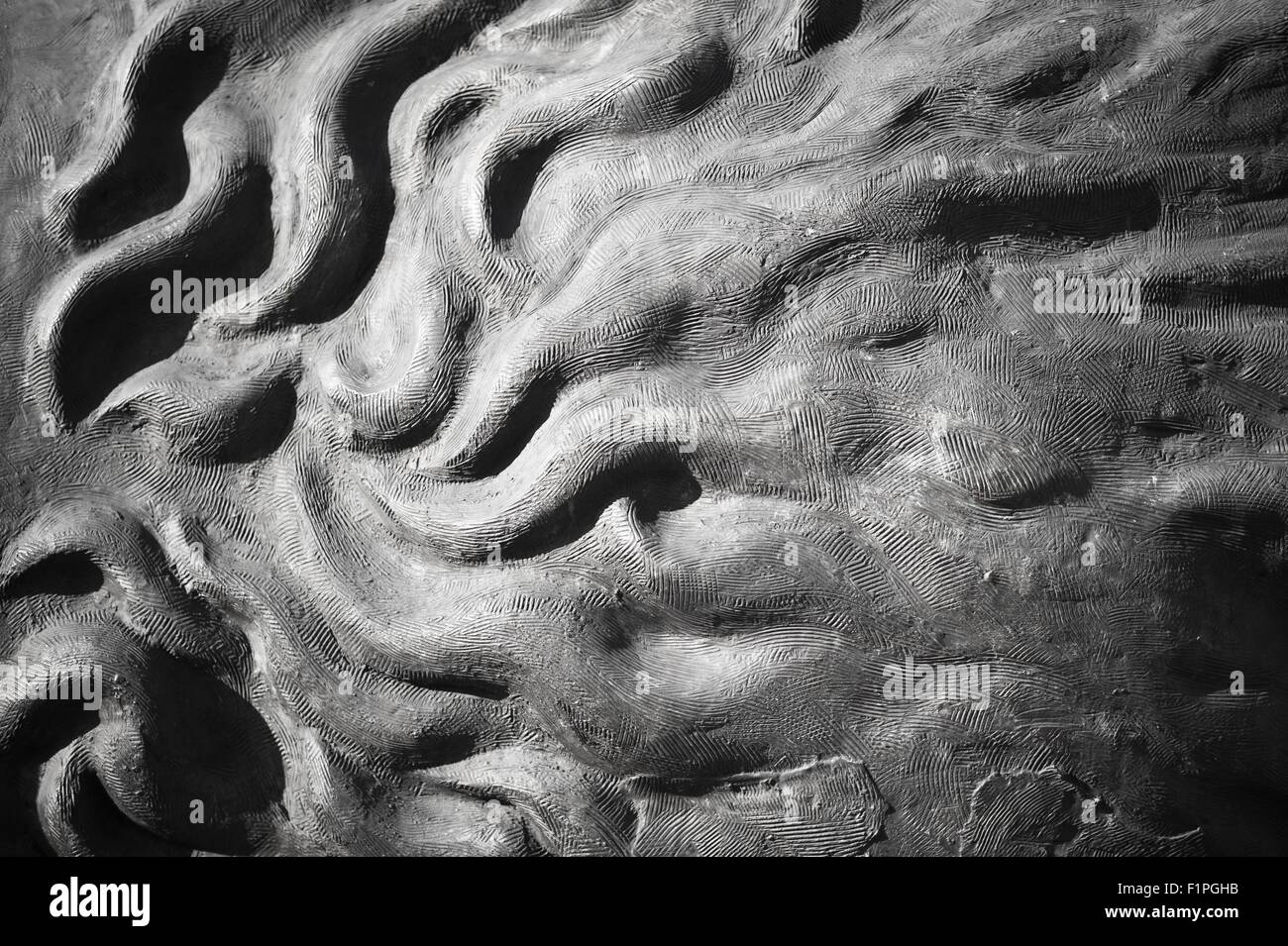 Scultura in calcestruzzo dello sfondo. Abstract ondulata forma d'Arte - Fotografia orizzontale Foto Stock