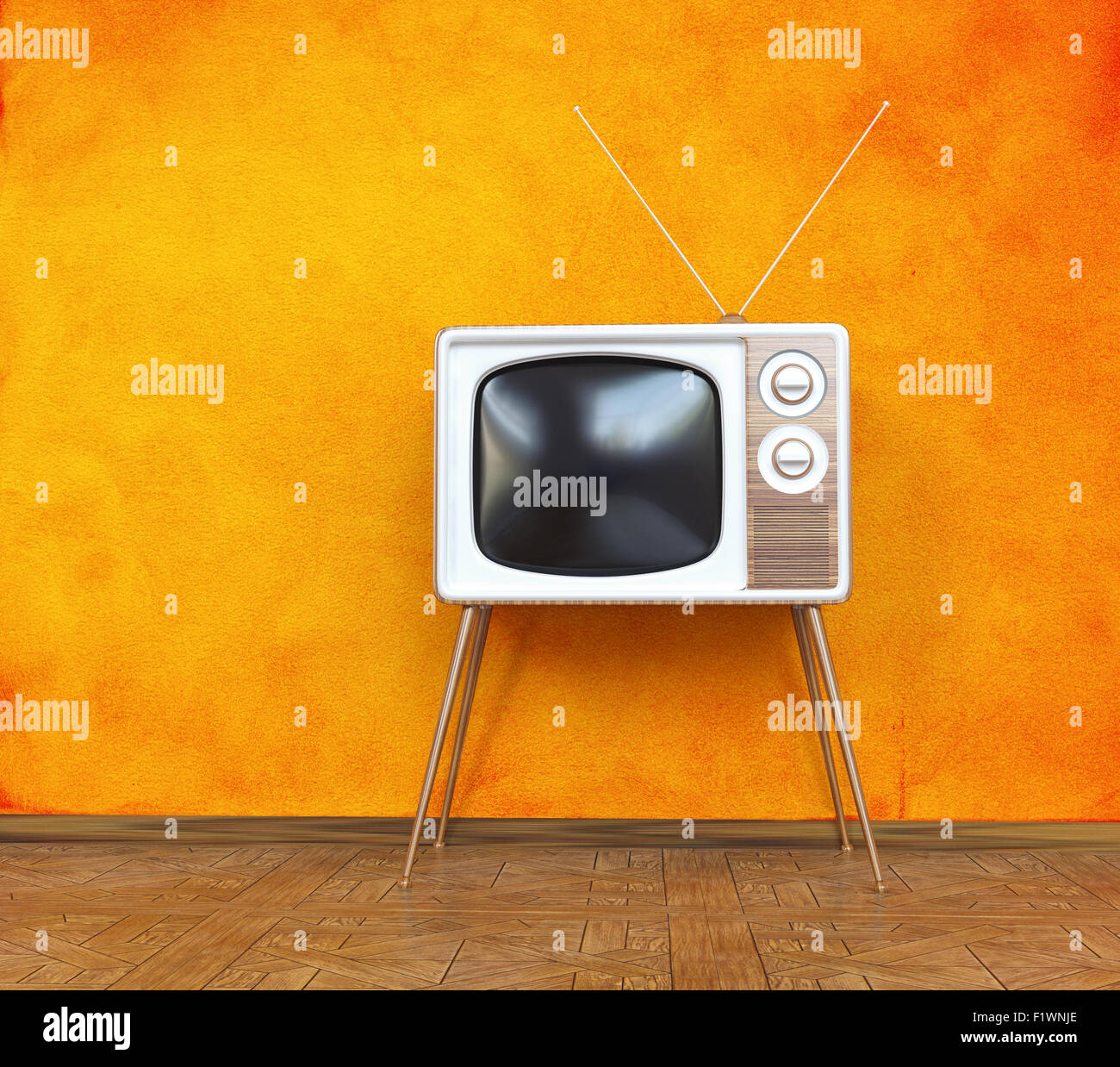 Vintage televisione su sfondo arancione. 3d concept Foto Stock