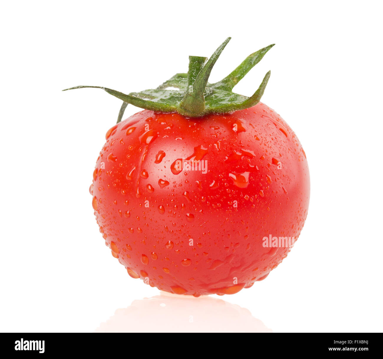 Il pomodoro con gocce isolate. Foto Stock