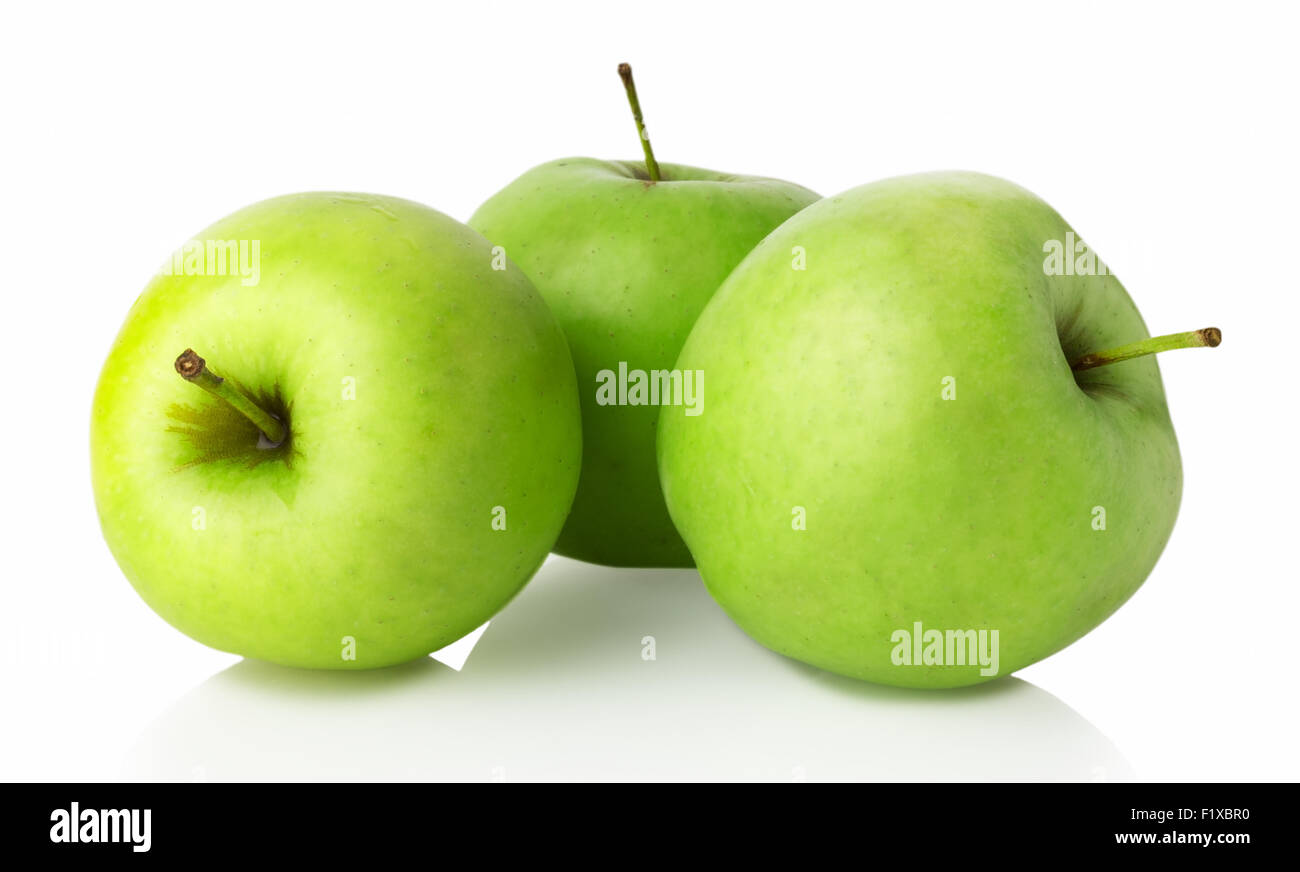 Tre mele verdi su sfondo bianco. Foto Stock