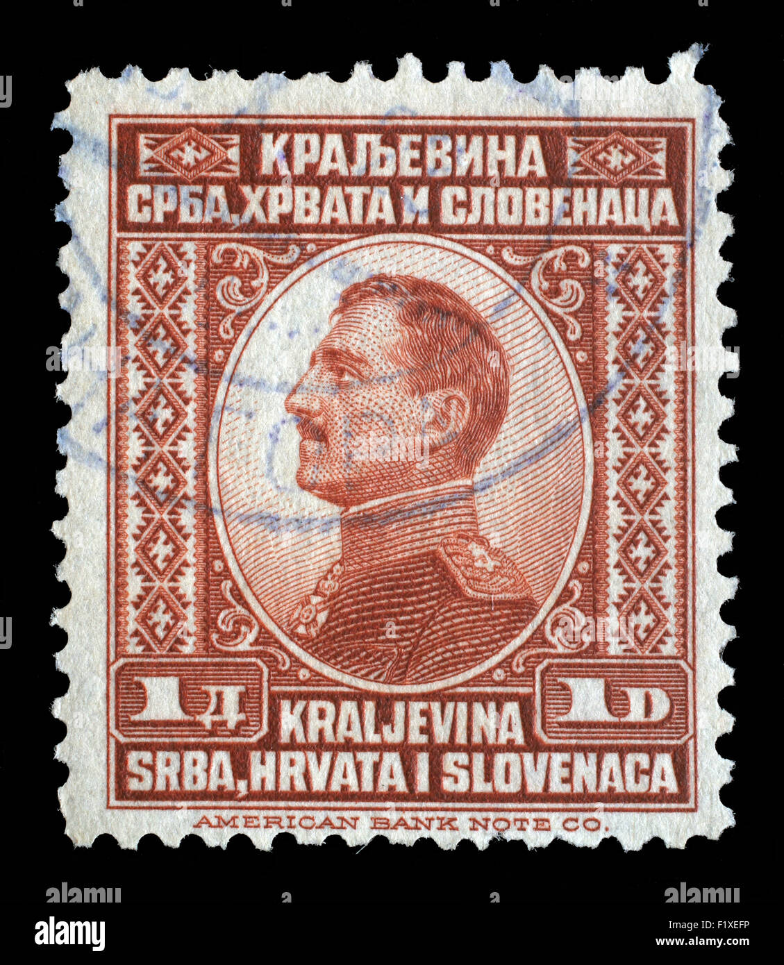 Timbro stampato in Iugoslavia (Regno della Serbia, della Croazia e della Slovenia) mostra ritratto del re Alessandro I, circa 1924 Foto Stock