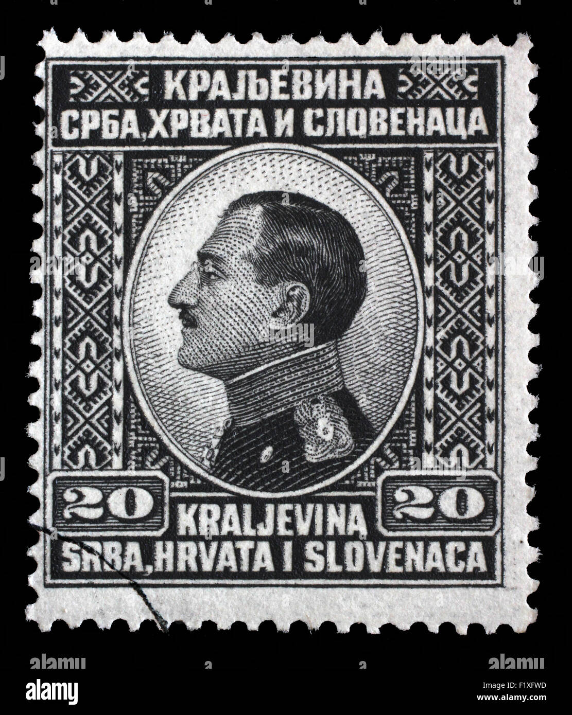 Timbro stampato in Iugoslavia (Regno della Serbia, della Croazia e della Slovenia) mostra ritratto del re Alessandro I, circa 1924 Foto Stock