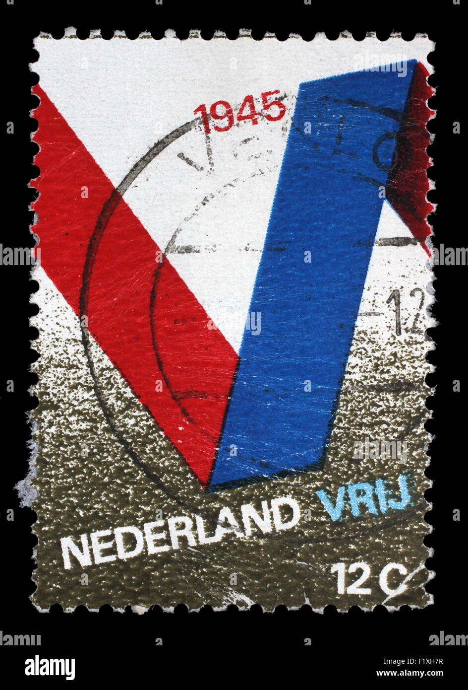 Timbro Stampato nei Paesi Bassi ha rilasciato per il XXV anniversario della liberazione mostra il simbolo V, circa 1970. Foto Stock